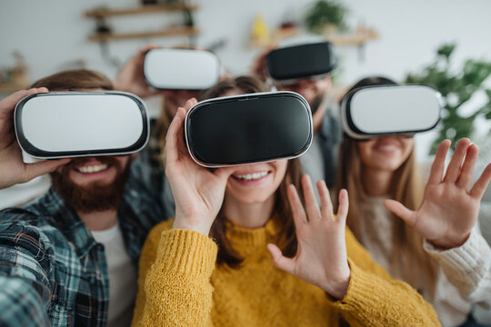 Group of people having fun while testing VR project