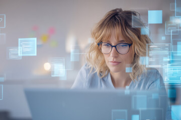 A focused woman with glasses works on a laptop, surrounded by futuristic digital interface graphics representing data and technology.