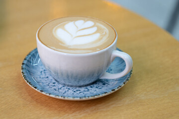 Cup of coffee with milk. Tasty