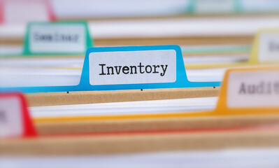 File folders with a tab labeled Inventory