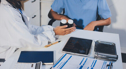 Young brunette woman having consultation at doctor office during