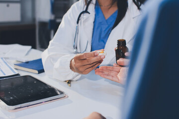 Young brunette woman having consultation at doctor office during