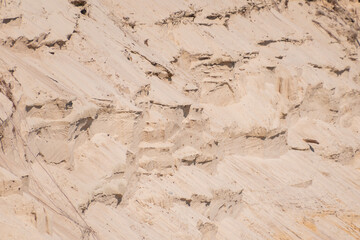Detailed sandstone rock formation with erosion patterns and natural textures