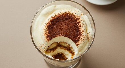Indulge in this creamy, decadent tiramisu, perfectly layered and dusted with cocoa.