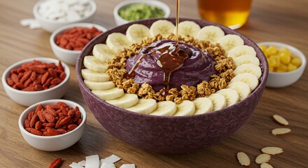 Indulge in this vibrant acai bowl, topped with fresh bananas, granola, and a drizzle of honey.