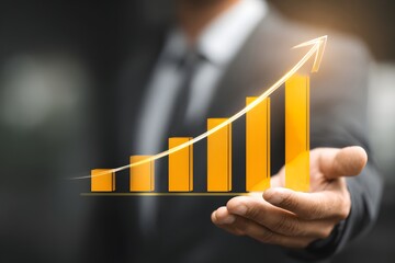 Businessman Holding Growing Financial Bar Chart.