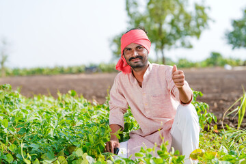 Indian farmer showing thumps up