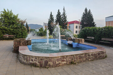 Fountain in Ust-Koksa Altai Republic, evening park