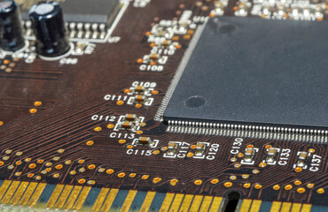 Printed circuit board with electronic components close up for science and technology project,...