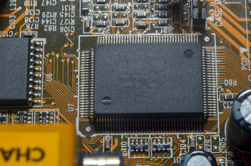 Printed circuit board with electronic components close up for science and technology project,...