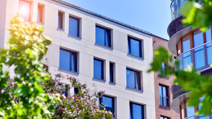 New modern block of flats in green area. complex. New modern block of flats in green area. European...