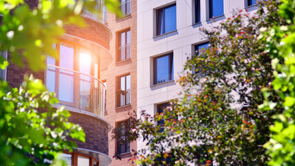 New modern block of flats in green area. complex. New modern block of flats in green area. European...