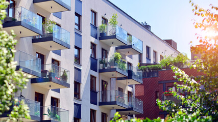 New modern block of flats in green area. complex. New modern block of flats in green area. European...