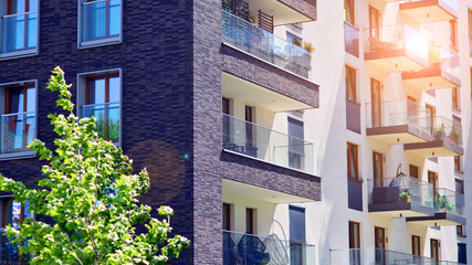 New modern block of flats in green area. complex. New modern block of flats in green area. European...