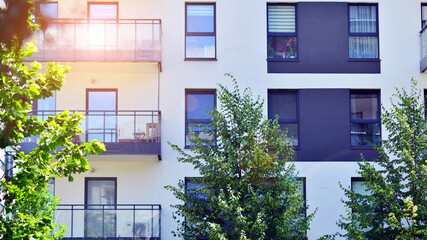 New modern block of flats in green area. complex. New modern block of flats in green area. European...