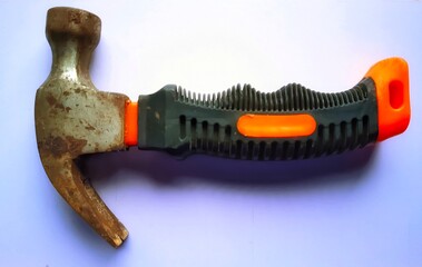 Rusty Claw Hammer with Orange and Black Grip Close-up View
