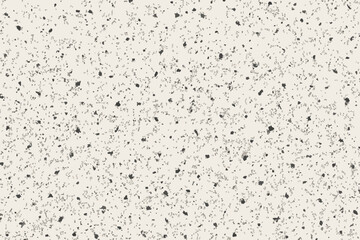 Soft ecru paper background with natural fleck organic texture