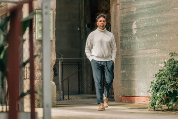 adult man visiting or traveling walking in ancient monument