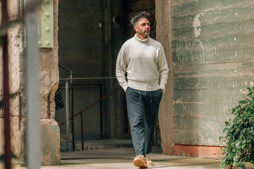 adult man visiting or traveling walking in ancient monument