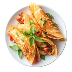 Overhead view of crepes filled with vegetables on a white plate dish