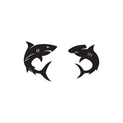 Obraz premium Two shark silhouettes facing each other on a white background, one is a hammerhead shark design