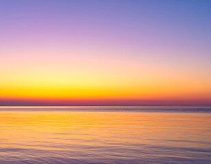 Obraz premium A horizontal color gradient mirroring a sunrise over a calm ocean, from deep violet to golden orange.