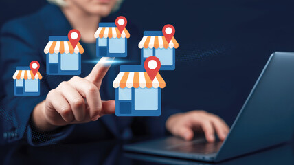 A man is pointing  a store map on screen. The map is made up of different store icons, and the man is pressing a button on the screen