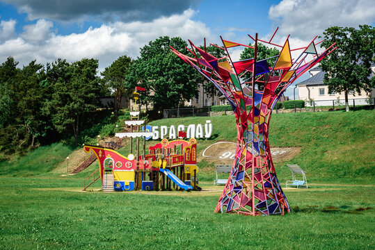 Braslav, Belarus &ndash; June 3, 2025: Inscription Braslav on the background of town and Lake Braslav.