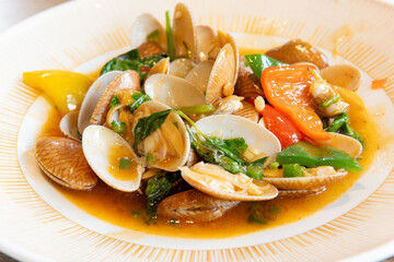 Fried clams with garlic in Dongguan restaurant, Guangdong, China, Asia