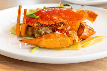 Fried crab with ginger and scallion, seafood meal from Dongguan restaurant in Guangdong, China, Asia