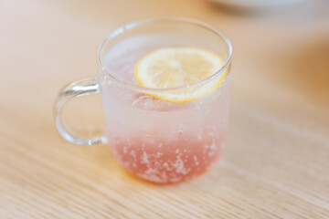 A glass of cool peach lemon sparkling juice in a bakery in Dongguan, Guangdong, China, Asia