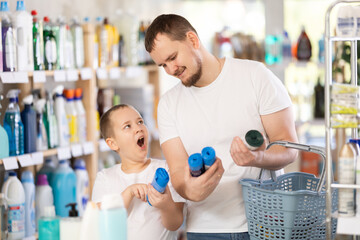 Dad tells son about choosing household goods, shows him suitable trash bags, and explains what to...