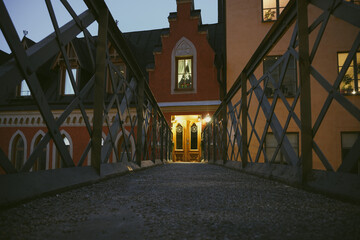 A footbridge to a building gate