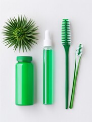 A collection of green personal care items including toothbrushes, bottles, and a succulent plant, arranged on a white background to showcase sustainable living