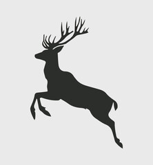 Silhouette of a majestic stag leaping gracefully, demonstrating power and movement.