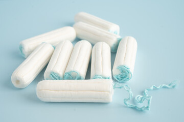 Menstruation cycle with sanitary cotton tampon for woman hygiene and protection.