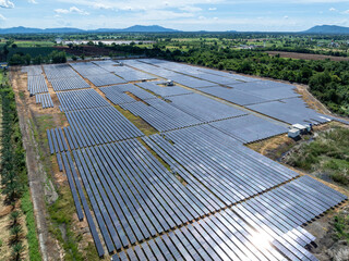 Aerial view of solar panel and power station with energy storage.