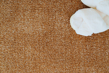 soft white slippers on the beige Interior pile carpet.