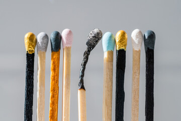 Group of colourful matches and one burned match. Diversity, inclusion abstract concept