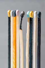 Group of colourful matches and one burned match. Diversity, inclusion abstract concept
