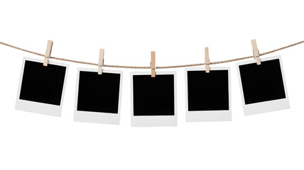 Five blank instant photos hang on twine with wooden clothespins, Isolated Transparent Background