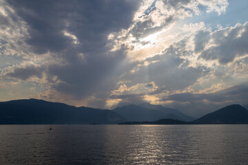 Serene Lakeview with Glowing Sky at Sunset Amid Calm Waters