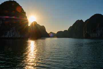 Vietnam, Halong Bay, UNESCO World Heritage Site, during sunset.