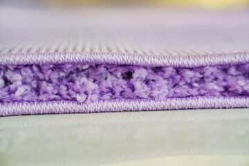 close-up. violet Interior pile carpet made of polypropylene.