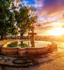 Beautiful Fountain at sunrise in View Lisbon Old Historical City In Portugal, Alfama, travel destinations