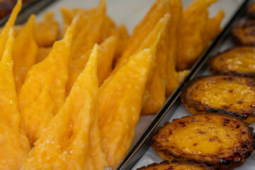 Typical Portuguese custard pastries in backery Lisbon