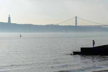 The bridge over the Tagus river from the Commerce square Lisbon old town Portugal