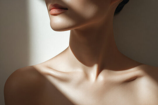 Smooth neck and shoulder with sunlight soft skin feminine beauty elegant jawline minimalistic style natural light healthy complexion serene mood closeup portrait delicate feature