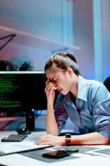 Stressed programmers, working overtime, developers feeling frustrated while fixing complex code errors are the challenges faced in software development.