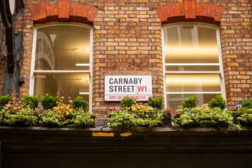 London- Carnaby Street W1, landmark street of high street fashion brands in Soho, central London
